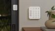 A Ring Alarm Contact Sensor protecting a sliding glass door inside a modern home