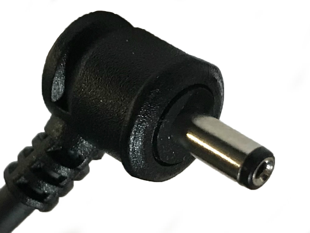Angled barrel power connector with a cylindrical metal tip. The connector body is made of plastic with a cord extending from one end.