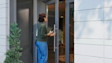 Person accessing Ring WallCall resident directory.