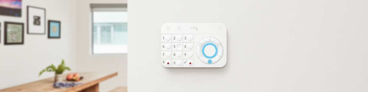 Ring Alarm (1st Generation) Keypad mounted to a wall inside a home.