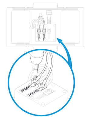 Illustration of a screw driver tightening the screws on the existing doorbell chime kit with the Jumper Cable installed.