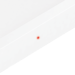 A white square power pack with a small red LED light illuminated on the front panel and the word "ring" in the top corner.
