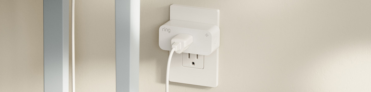 Image showing the Indoor Smart Plug installed in to a modern outlet.