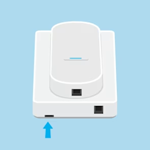 Illustration of Intercom with an arrow pointing up to the tab where a screwdriver gets inserted to remove the front cover if it is a pull-off cover.