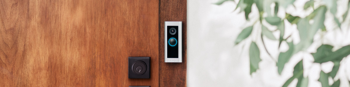 Ring Video Doorbell Pro 2 on a modern home's front door.