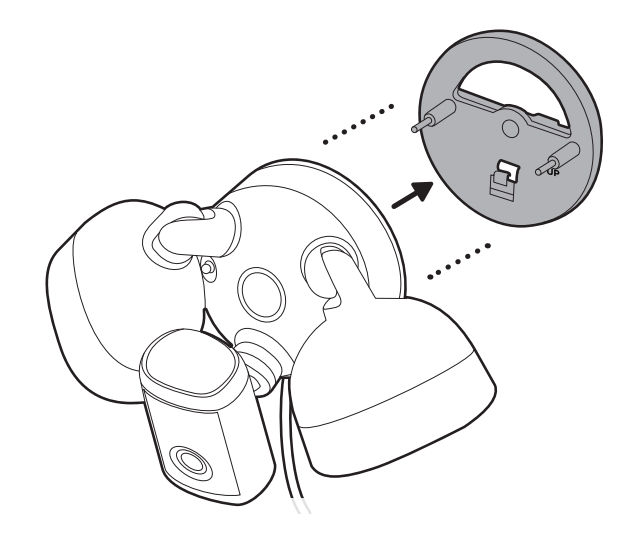 Illustration of how to remove the mounting plate from the back of your camera fixture