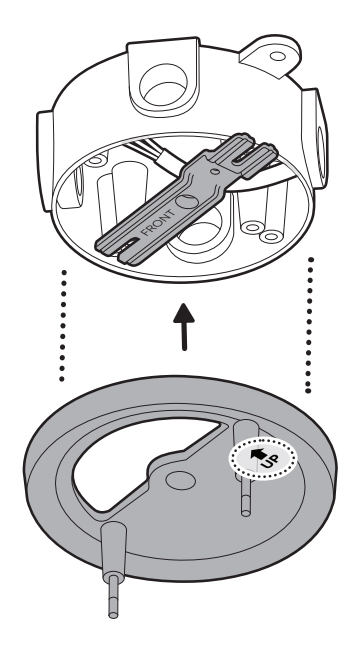Illustration showing how to align the mounting plate over the metal mounting bracket. 