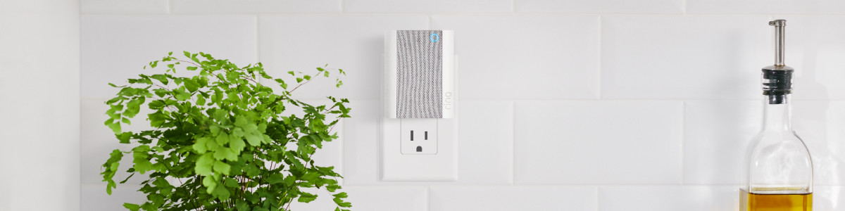 Ring Chime (2nd Generation) plugged into a wall in a modern kitchen