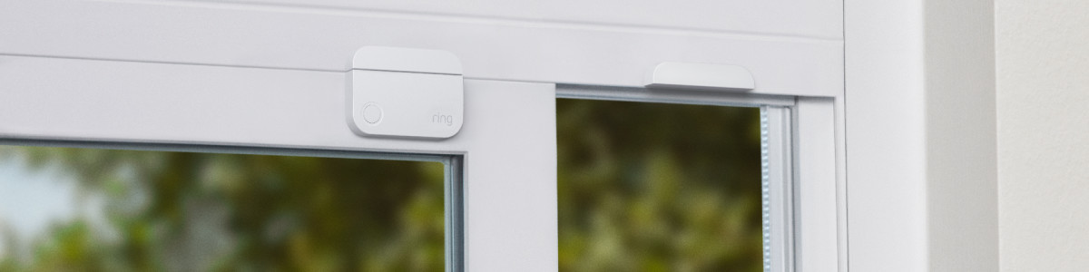 A Ring Alarm Contact Sensor protecting a window inside a modern home.