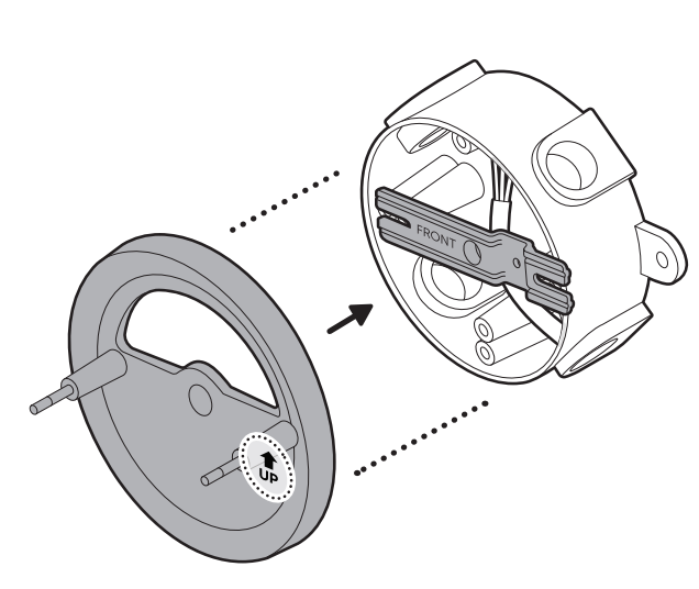 Illustration of how to align the mounting plate over the metal mounting bracket with the UP arrow pointing up.