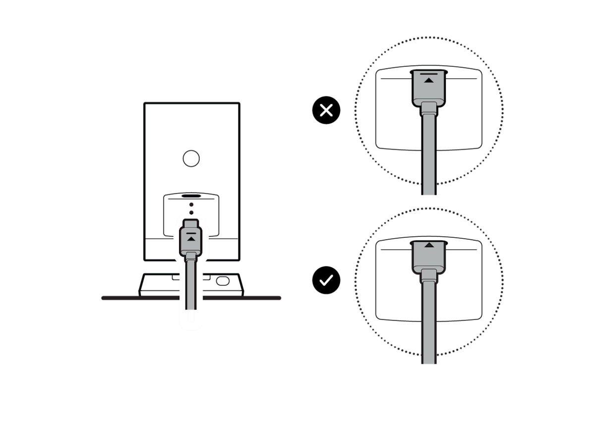 Illustration of the back of a camera with a USB-C cable properly inserted into the port and a check next to it, and an "X" next to one that is not inserted past the marker.