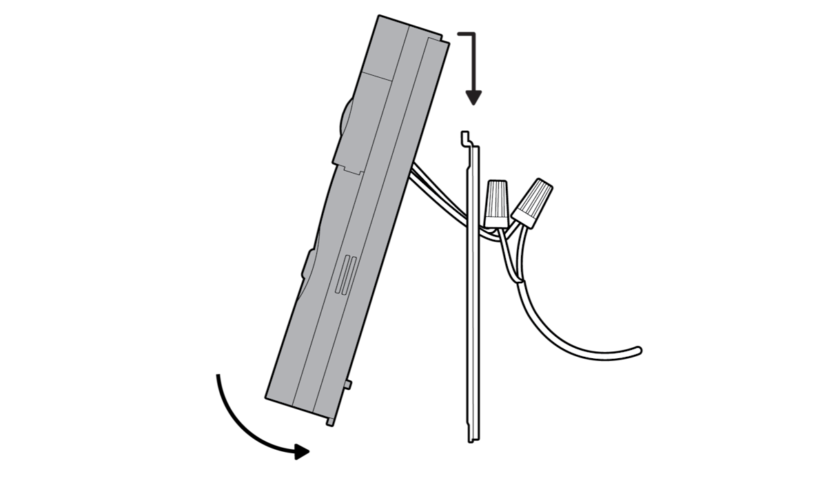 Diagram that shows how the Ring device hooks onto the wall mount with directional arrows