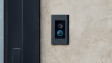 Ring Video Doorbell Elite connected through ethernet on a modern home's front door.