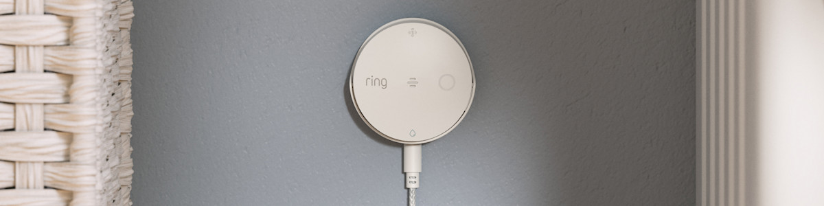 Image showing the Sump Pump Monitor installed in a modern bathroom.