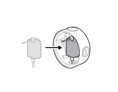 Illustration showing the adapter being slotted into the center of the junction box.