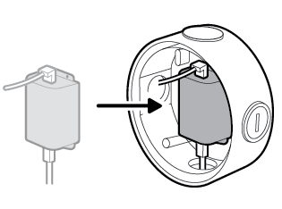 Illustration to show slotting the adapter into the junction box.