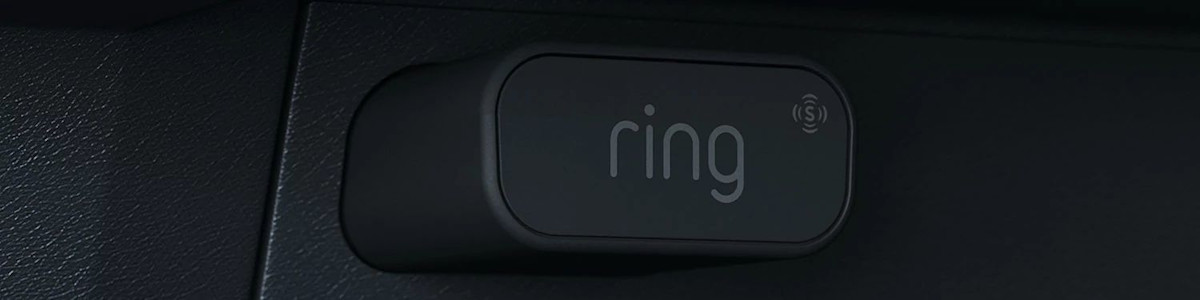 Image of the Car alarm plugged into the OBD-II port of a vehicle.