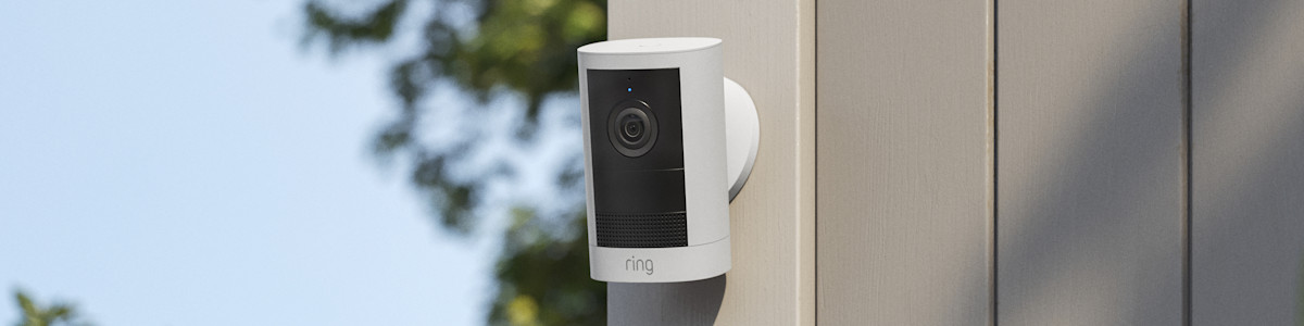 Article Header Image showing Outdoor Cam (2nd Gen) installed on the exterior of a modern home.