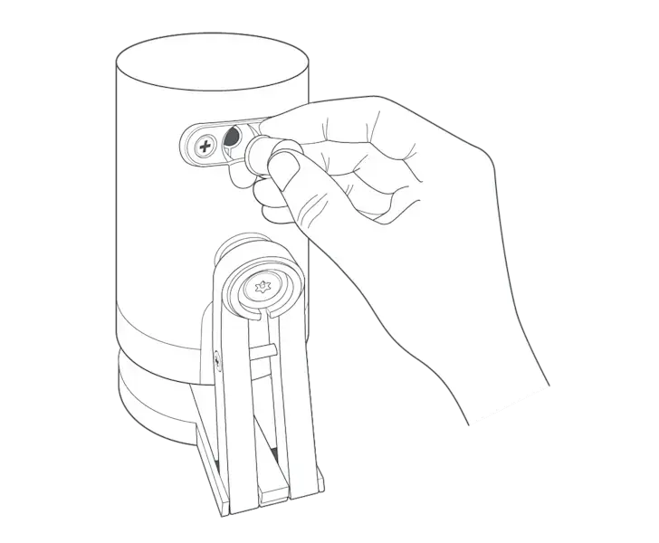 Illustration of the back of a camera showing where to insert the rubber plug from the rear of your Stick Up Cam unit.