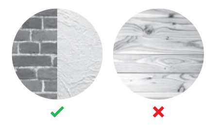 Brick and stucco shown with a green check mark for use with wall anchors.  Wood shown with a red X does not use wall anchors.