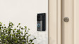 Solar Charger for Battery Doorbell on the exterior of a modern home.