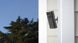 Ring Stick Up Cam (1st Generation) mounted on a porch wall.