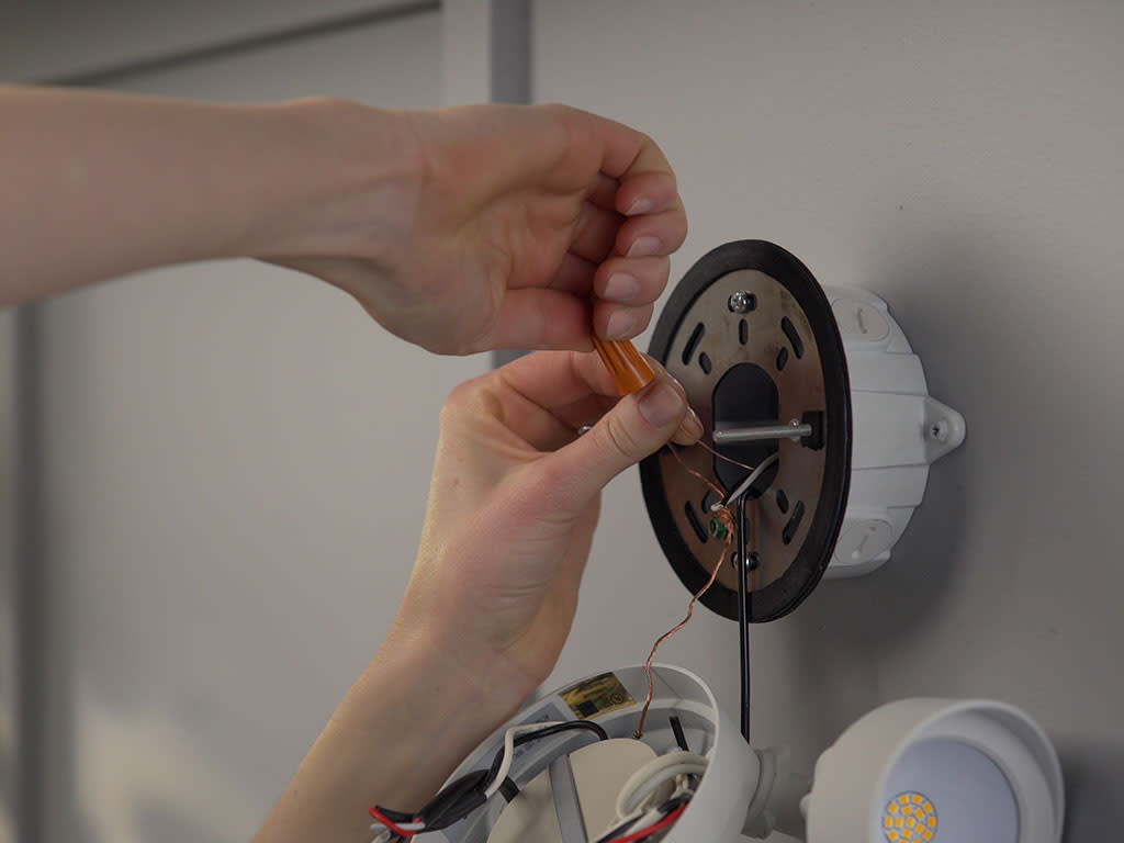 Wrapping electrical wire for Floodlight Cam.