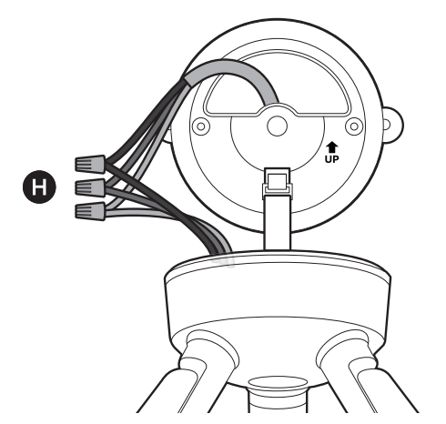 Illustration showing how to remove the precut wire sleeve to expose the wire end and use the included wire nuts to connect the wires to the camera.
