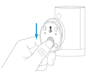 Illustration of how to remove the mounting bracket from the base on the Outdoor Cam. 