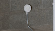 Image showing the Sump Pump Monitor installed in a basement area.