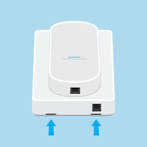 Illustration of Ring Intercom with 2 blue arrows pointing up at the hidden tabs where a screwdriver is inserted to remove the cover.